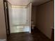 Bathroom with a white shower-tub combo and a matching toilet at 436 Laurel Trce, Carrollton, GA 30116