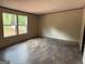 A new bedroom featuring luxury vinyl flooring and neutral paint color at 436 Laurel Trce, Carrollton, GA 30116
