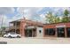 Commercial buildings with brick facades are visible in Austell's downtown area at 5880 Mulberry St, Austell, GA 30168