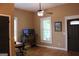 Bright office space with hardwood floors, natural light, and neutral paint at 5880 Mulberry St, Austell, GA 30168