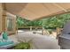 Spacious covered deck offering outdoor lounging with view of fenced backyard and inground pool at 140 Olivia Ct, Fayetteville, GA 30215