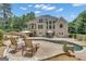 Spacious backyard featuring an in-ground pool with diving board and lounge chairs at 140 Olivia Ct, Fayetteville, GA 30215