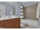 Bathroom with tiled shower, updated vanity, and great lighting at 140 Olivia Ct, Fayetteville, GA 30215