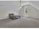 Spacious bedroom with high ceilings, a ceiling fan, and natural light from a large window at 140 Olivia Ct, Fayetteville, GA 30215