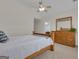 Bedroom featuring vaulted ceiling, ample lighting, and ensuite bathroom at 140 Olivia Ct, Fayetteville, GA 30215