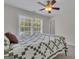 Bedroom with a view of the backyard and a window with white blinds at 140 Olivia Ct, Fayetteville, GA 30215
