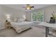Bedroom with large window, ceiling fan and neutral decor at 140 Olivia Ct, Fayetteville, GA 30215
