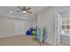 Bonus room for storage with ceiling fan and recessed lighting at 140 Olivia Ct, Fayetteville, GA 30215