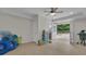 Bonus room for storage with recessed lighting and a view to the pool area at 140 Olivia Ct, Fayetteville, GA 30215