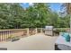 Beautiful deck, stainless steel grill, and wooded backyard at 140 Olivia Ct, Fayetteville, GA 30215