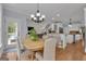 Bright eat-in kitchen features hardwood floors and lots of natural light at 140 Olivia Ct, Fayetteville, GA 30215