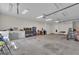 Spacious garage featuring ample tool storage, work space, and concrete flooring at 140 Olivia Ct, Fayetteville, GA 30215
