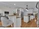Open kitchen features an island, stainless steel appliances, and breakfast bar at 140 Olivia Ct, Fayetteville, GA 30215