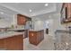 A kitchen featuring stainless steel appliances, granite countertops, and a kitchen island at 140 Olivia Ct, Fayetteville, GA 30215