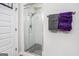 Bathroom with glass shower enclosure, subway tile, and modern showerhead at 9148 Tarnwood Dr, Villa Rica, GA 30180