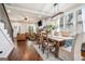 Open-concept dining area with hardwood floors and lots of natural light at 9148 Tarnwood Dr, Villa Rica, GA 30180