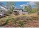 Expansive backyard featuring a large deck and fire pit, perfect for outdoor entertaining at 3797 Churchill Sw Dr, Marietta, GA 30064