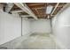 Unfinished basement with exposed pipes and concrete floors offers potential for future customization at 3797 Churchill Sw Dr, Marietta, GA 30064