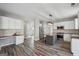 Spacious open kitchen with island, stainless appliances, and plenty of counter space at 6448 Mobilis Ct, Sugar Hill, GA 30518