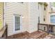 Inviting outdoor deck area, great for entertaining guests, features an entry door at 1099 Westfield Se Trce, Smyrna, GA 30082