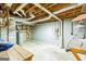 Unfinished basement with exposed ceiling, ideal for storage or potential to customize at 1099 Westfield Se Trce, Smyrna, GA 30082