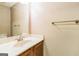 Bright bathroom with single sink vanity and classic fixtures, perfect for everyday convenience at 1099 Westfield Se Trce, Smyrna, GA 30082