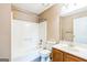Cozy bathroom with standard tub and shower, combined with a classic vanity at 1099 Westfield Se Trce, Smyrna, GA 30082