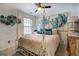 Bedroom with bright, neutral colors and a hanging frame bed at 2587 Alvecot Cir, Atlanta, GA 30339