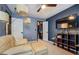 Bedroom with blue accent wall and a walk in closet at 2587 Alvecot Cir, Atlanta, GA 30339