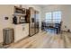 Modern kitchen boasts stainless steel appliances, white cabinets and dining area at 2587 Alvecot Cir, Atlanta, GA 30339