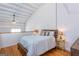 Cozy upstairs bedroom with high ceilings and comfortable queen bed at 1661 La France Street Ne Unit #216, Atlanta, GA 30307