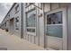 Metal exterior with window and door showcasing the building's modern, industrial-style design at 1661 La France Street Ne Unit #216, Atlanta, GA 30307