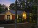 Inviting front exterior of home featuring a brick facade, manicured landscaping, and a warm, welcoming entrance at 107 Calloway Xing, Peachtree City, GA 30269