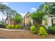 Beautiful single-story home with brick facade, manicured landscaping, and inviting entrance at 107 Calloway Xing, Peachtree City, GA 30269