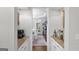Butler's pantry featuring granite countertops and white cabinets at 107 Calloway Xing, Peachtree City, GA 30269