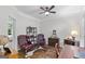 Study/Office with hardwood flooring, leather chairs, dark furniture, and a cowhide rug at 107 Calloway Xing, Peachtree City, GA 30269