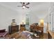 Study/Office with hardwood flooring, desk, hardwood desk, and a cowhide rug at 107 Calloway Xing, Peachtree City, GA 30269