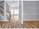 Inviting living room with wood floors and natural light, creating a warm and open atmosphere at 269 Legends Trce, Mcdonough, GA 30253