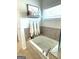 Relaxing bathtub with decorative shelving and accessories at 5257 Shorthorn Way, Powder Springs, GA 30127