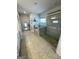 Bathroom featuring a stand-up shower with glass doors and tile at 5257 Shorthorn Way, Powder Springs, GA 30127