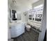 Bathroom featuring a modern vanity, toilet, and decorative shower curtain at 5257 Shorthorn Way, Powder Springs, GA 30127