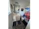 Cozy bathroom featuring a white vanity, a toilet, and a playful football-themed shower curtain at 5257 Shorthorn Way, Powder Springs, GA 30127