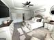 Bedroom featuring tray ceilings, a ceiling fan, and natural light at 5257 Shorthorn Way, Powder Springs, GA 30127