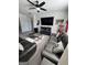 Recreational room with media center, comfortable seating and movie decor at 5257 Shorthorn Way, Powder Springs, GA 30127