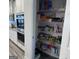 Walk-in pantry with organized shelving, showcasing abundant storage space at 5257 Shorthorn Way, Powder Springs, GA 30127