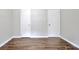 Well lit bedroom has wood flooring and neutral color at 260 Sharon Dr, Fayetteville, GA 30214