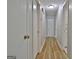 Hallway featuring wood-look flooring and neutral wall paint at 260 Sharon Dr, Fayetteville, GA 30214