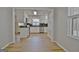 Open-concept layout showcasing the kitchen and dining area at 260 Sharon Dr, Fayetteville, GA 30214