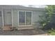 The backyard features a sliding glass door and a back entrance door at 250 Jonesboro Rd, Jonesboro, GA 30236