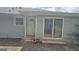 The backyard features a sliding glass door and a back entrance door at 250 Jonesboro Rd, Jonesboro, GA 30236